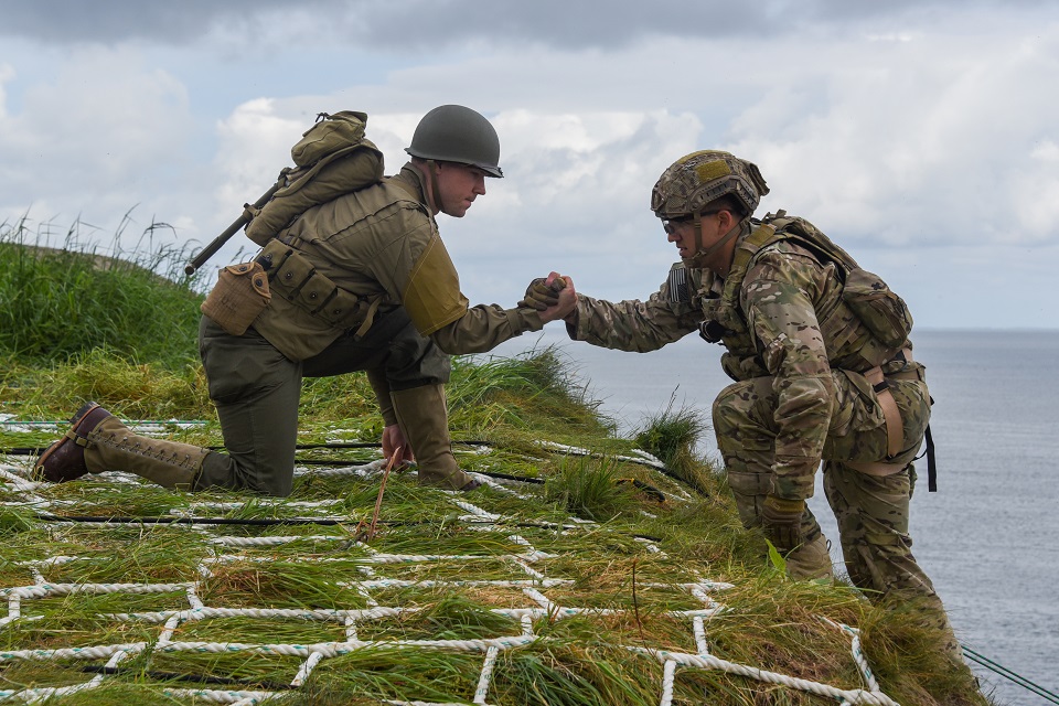 Rangers climbing the cliffs at Pointe du Hoc